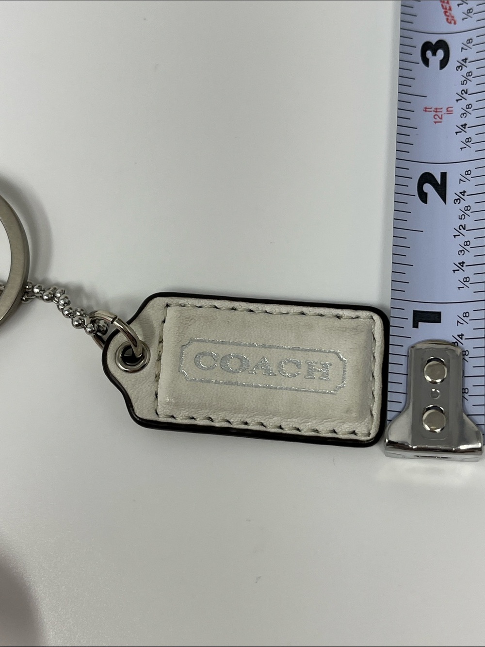 COACH HANG TAG WHITE AND SILVER WITH BONUS PINK SPARKLE MATTE SILVER KEYCHAIN - Picture 7 of 11